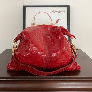 A red shoulder bag.